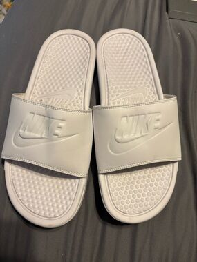 Nike White Slide Sandals with Embossed Swoosh
